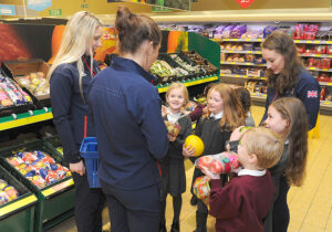 British Olympic athletes joined children at an Aldi shop to help them learn about healthy eating