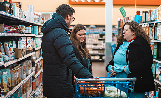 People shopping for groceries - stakeholder financial wellbeing